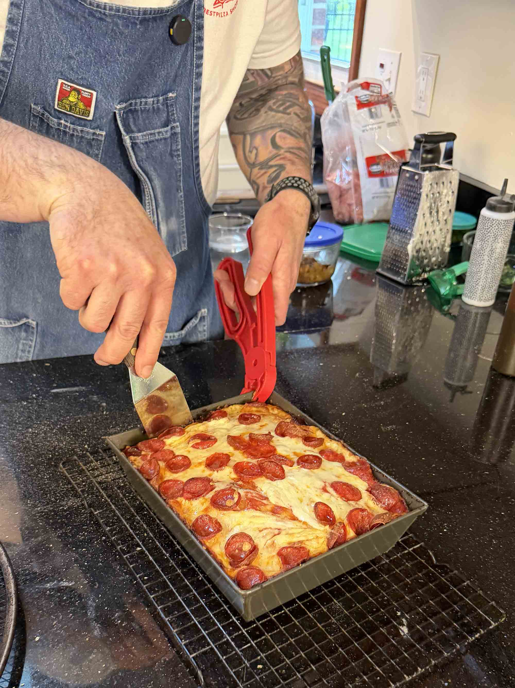 Jesse Wisinski from The Best Pizza Shop making a Detroit pizza