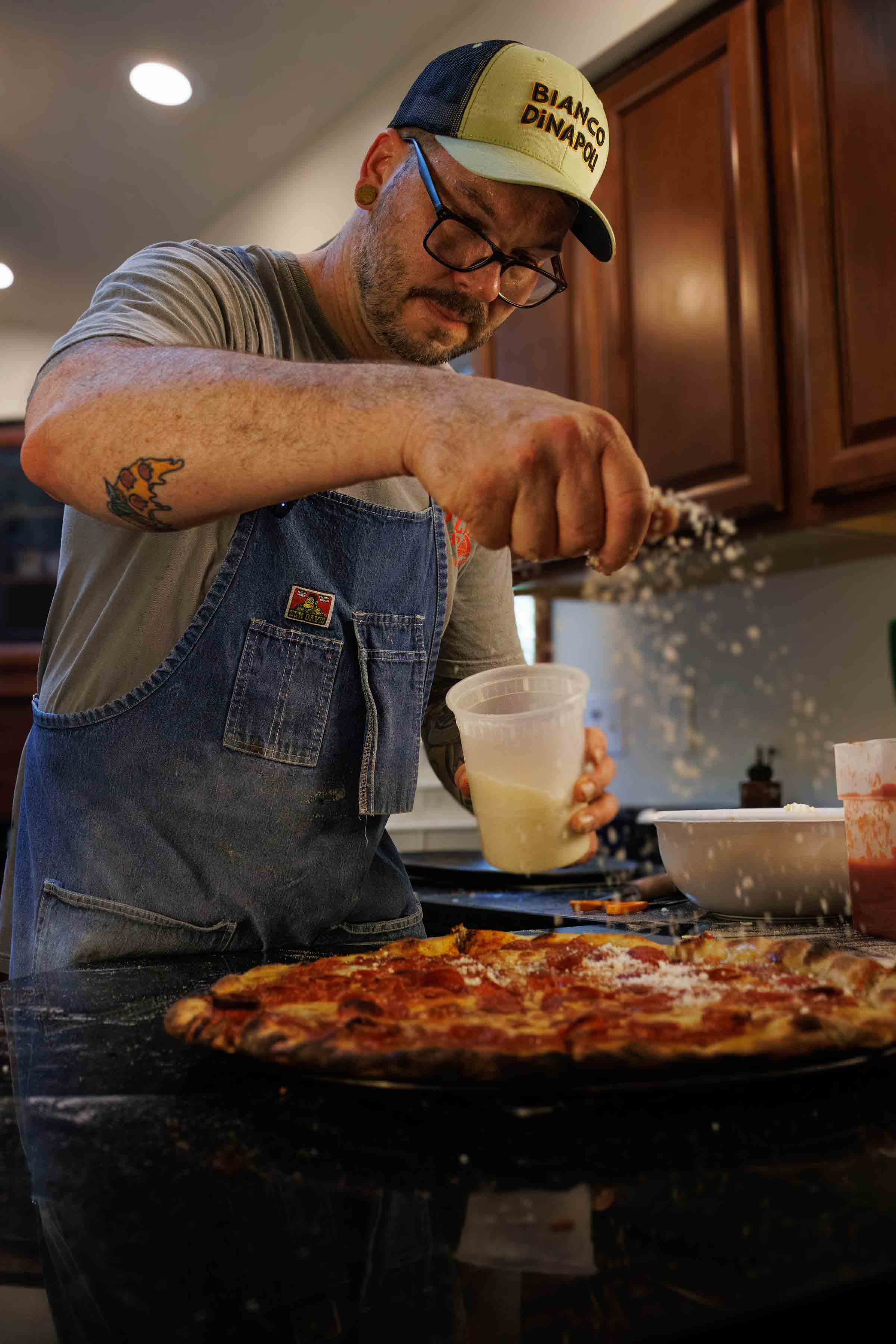 Jesse Wisinski making pizza in Beaver County, Pennsylvania