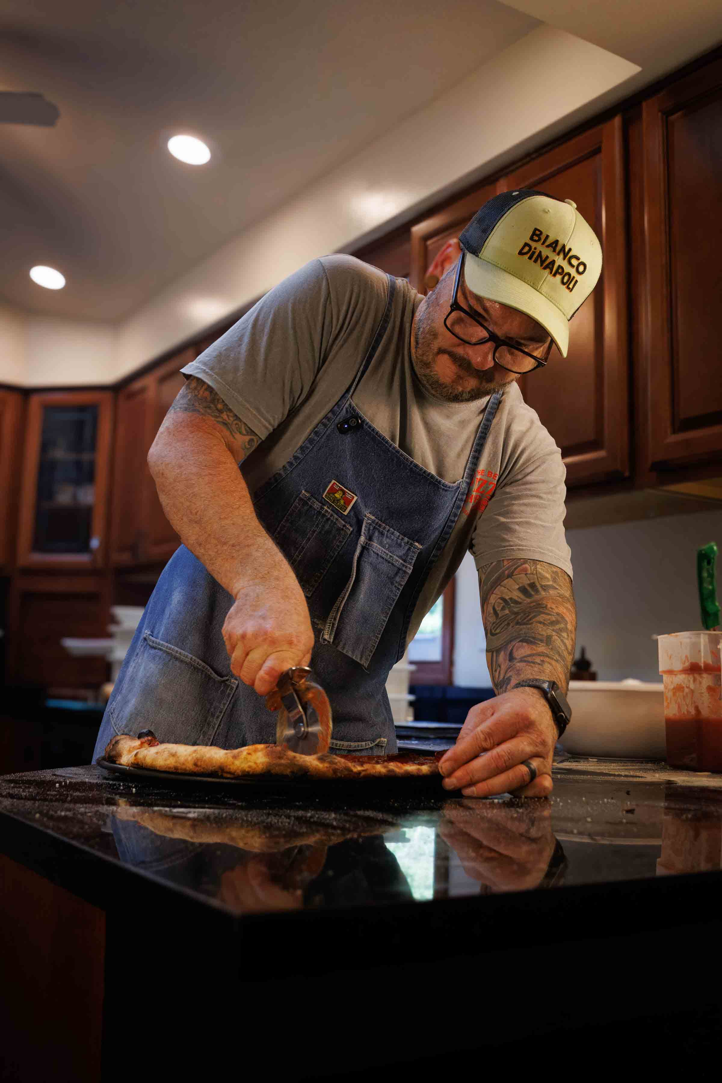 Jesse Wisinski making pizzas for a community fundraiser in Beaver County